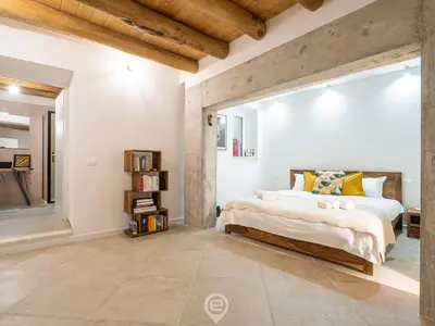 Letto o letti in una camera di Classic Urban Elegance