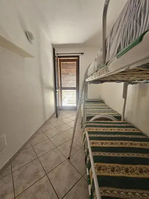 Letto o letti in una camera di Villa vicino al mare