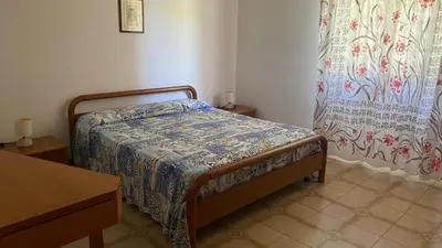 Letto o letti in una camera di Casa Ibiscus
