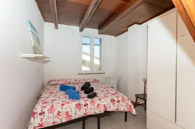 Letto o letti in una camera di Casa con vista mozzafiato