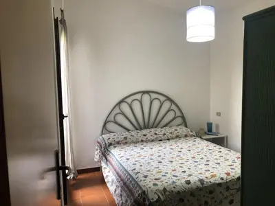 Letto o letti in una camera di Villetta Simius Luxury