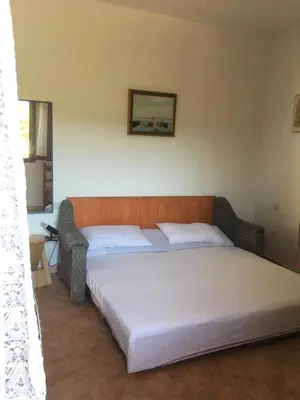 Letto o letti in una camera di Villa Silvia