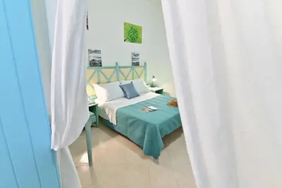 Letto o letti in una camera di IzzHome Sea Style Apartment