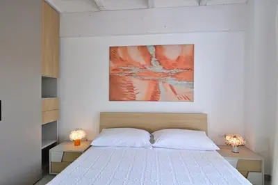 Letto o letti in una camera di Villa Iside