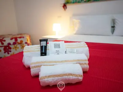 Letto o letti in una camera di Villanova Rooms