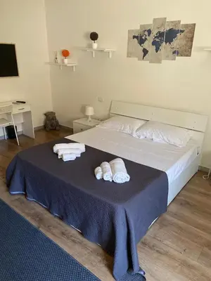 Letto o letti in una camera di Villanova Rooms
