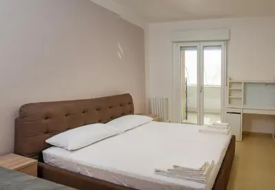 Letto o letti in una camera di Monsoni House
