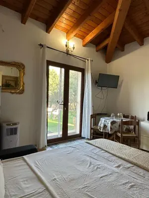Letto o letti in una camera di La Coccinella