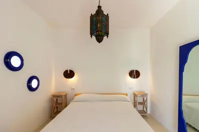 Letto o letti in una camera di Villa Tuna