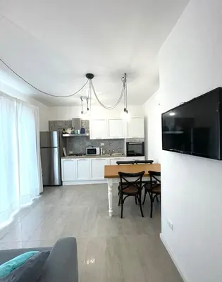 Cucina o angolo cottura di Libeccio Apartment, Rosa dei Venti, Perla Marina