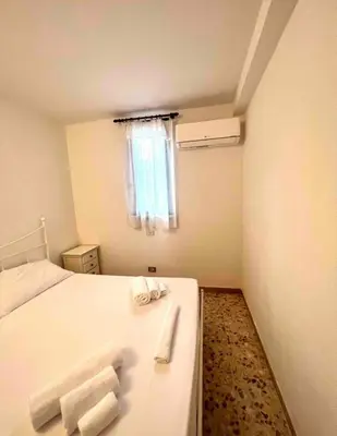 Letto o letti in una camera di Maestrale Apartment, Rosa dei Venti, Perla Marina