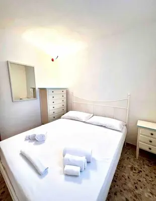 Letto o letti in una camera di Maestrale Apartment, Rosa dei Venti, Perla Marina