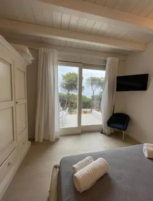 Letto o letti in una camera di Scirocco Apartment, Rosa dei Venti, Perla Marina