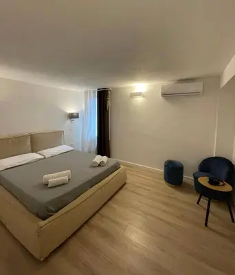 Letto o letti in una camera di Scirocco Apartment, Rosa dei Venti, Perla Marina