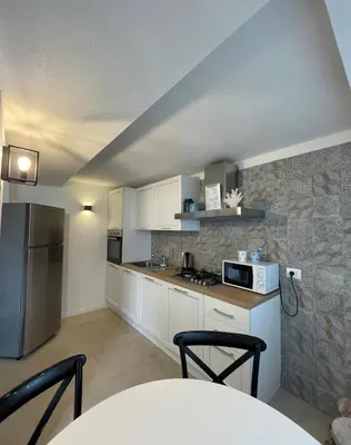 Cucina o angolo cottura di Scirocco Apartment, Rosa dei Venti, Perla Marina