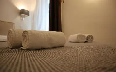 Letto o letti in una camera di Scirocco Apartment, Rosa dei Venti, Perla Marina