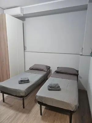Letto o letti in una camera di Oasi del sole REGINA