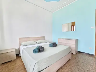 Letto o letti in una camera di Villa Nina