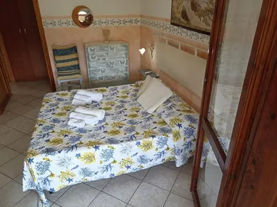 Letto o letti in una camera di Orizzonte Sardo