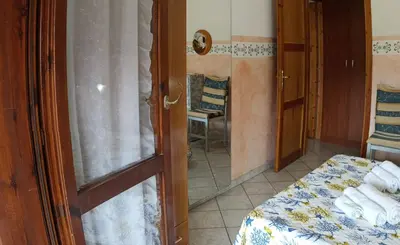 Letto o letti in una camera di Orizzonte Sardo