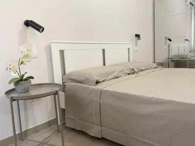 Letto o letti in una camera di Nune - Apartment & Room
