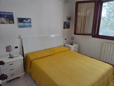 Letto o letti in una camera di Casa Eugenia