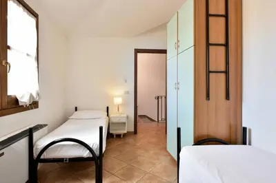 Letto o letti in una camera di Il rifugio del Frank