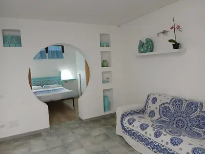Letto o letti in una camera di La Fillirea