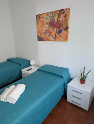 Letto o letti in una camera di Casa MAM