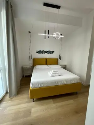 Letto o letti in una camera di Palazzo Cavour Rooms & Breakfast