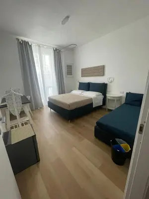 Letto o letti in una camera di Palazzo Cavour Rooms & Breakfast