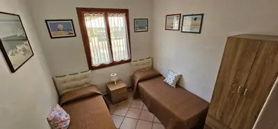 Area soggiorno di Casa Spiga - Solanas, near the beach