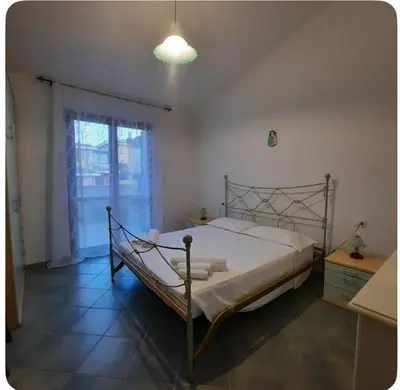 Letto o letti in una camera di Casa Bella Vista