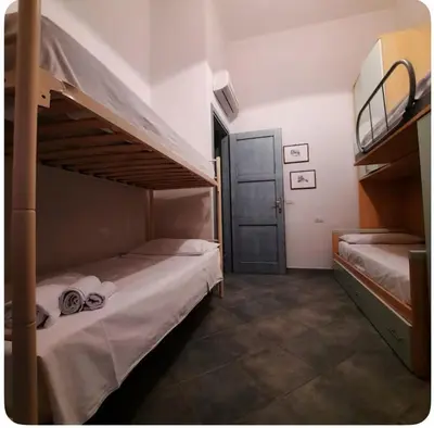 Letto o letti in una camera di Casa Bella Vista