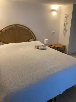 Letto o letti in una camera di Villa Roberta