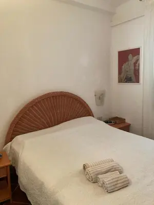 Letto o letti in una camera di Villa Roberta