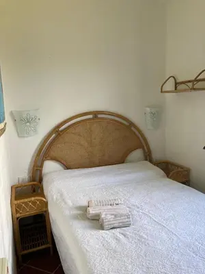 Letto o letti in una camera di Villa Roberta