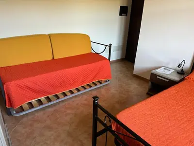 Letto o letti in una camera di Agriturismo La Fillirea