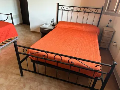 Letto o letti in una camera di Agriturismo La Fillirea