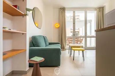 Area soggiorno di Bright Trieste Terrace Studio