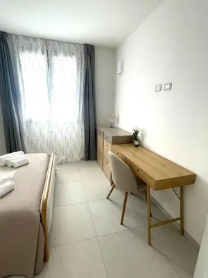 Letto o letti in una camera di Domus Apartments
