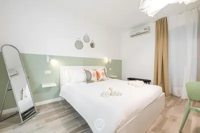 Letto o letti in una camera di Alice House
