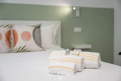 Letto o letti in una camera di Alice House