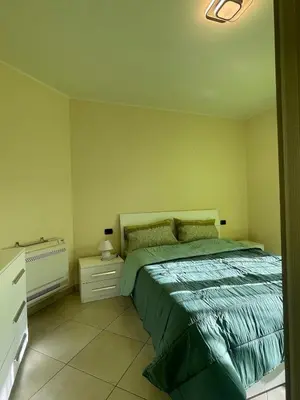 Letto o letti in una camera di La dolce vita apartment free parking