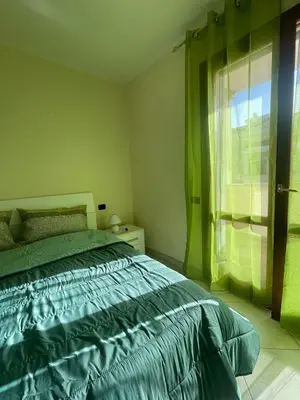 Letto o letti in una camera di La dolce vita apartment free parking