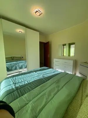 Letto o letti in una camera di La dolce vita apartment free parking