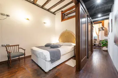 Letto o letti in una camera di Antica Dimora Baylle