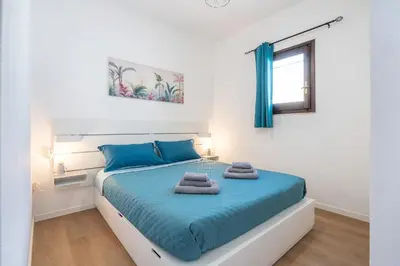 Letto o letti in una camera di Casa Anna