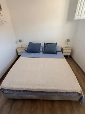 Letto o letti in una camera di Casa Rosmarino
