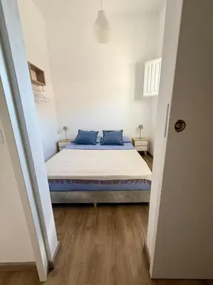 Letto o letti in una camera di Casa Rosmarino